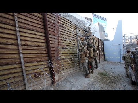 US Hardens Border At Tijuana To Prepare For Migrant Caravan